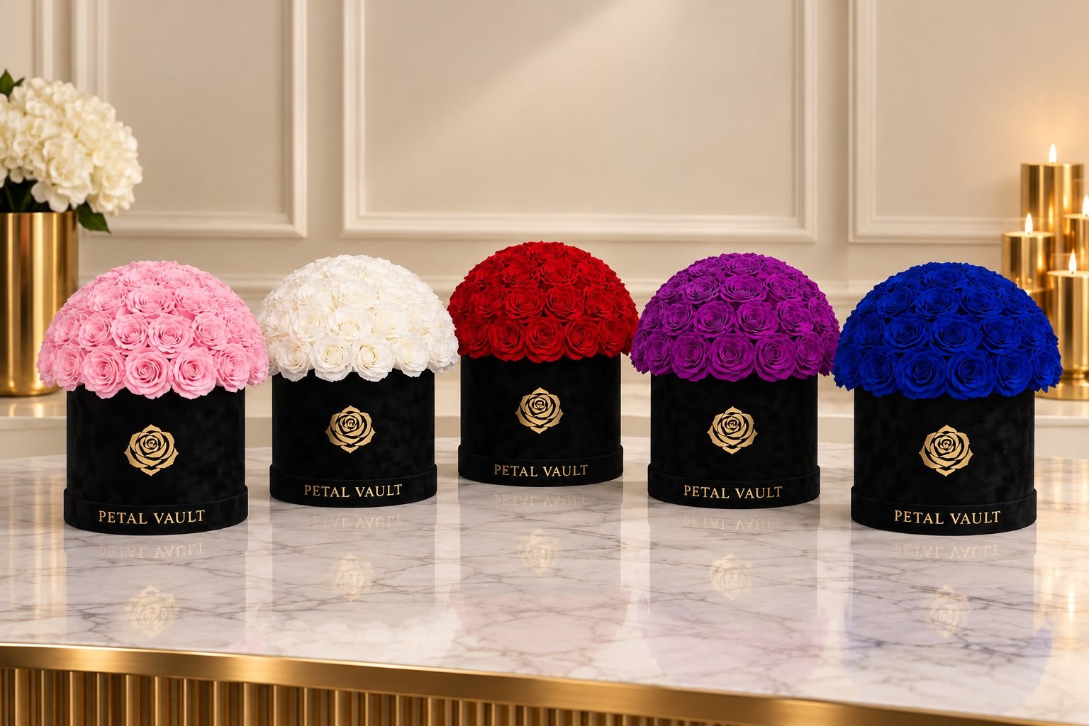 Five black velvet boxes topped with pink, white, red, purple and blue preserved roses